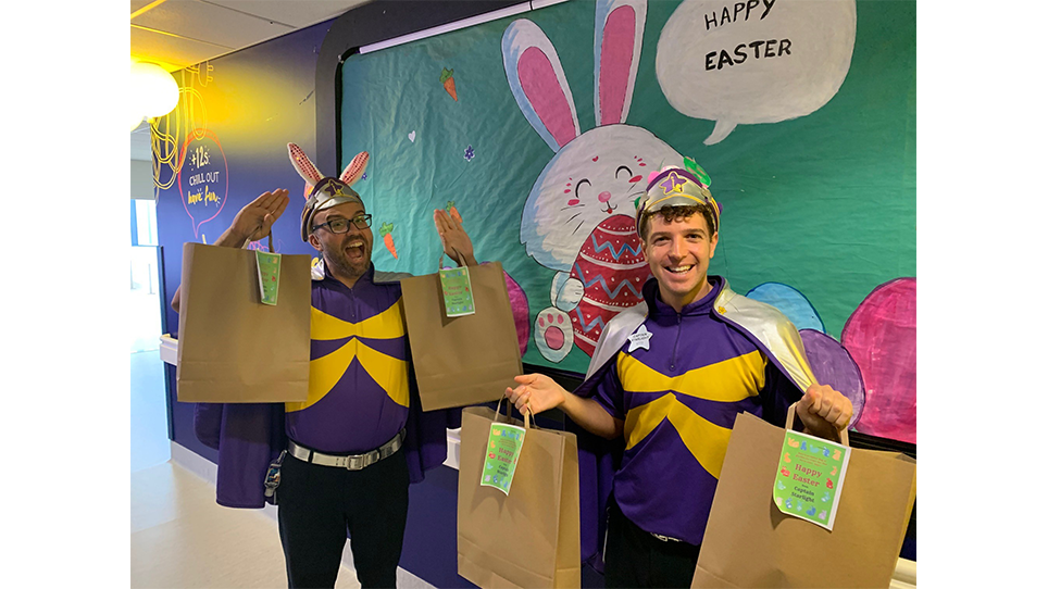 Captain Starlight holding showbags