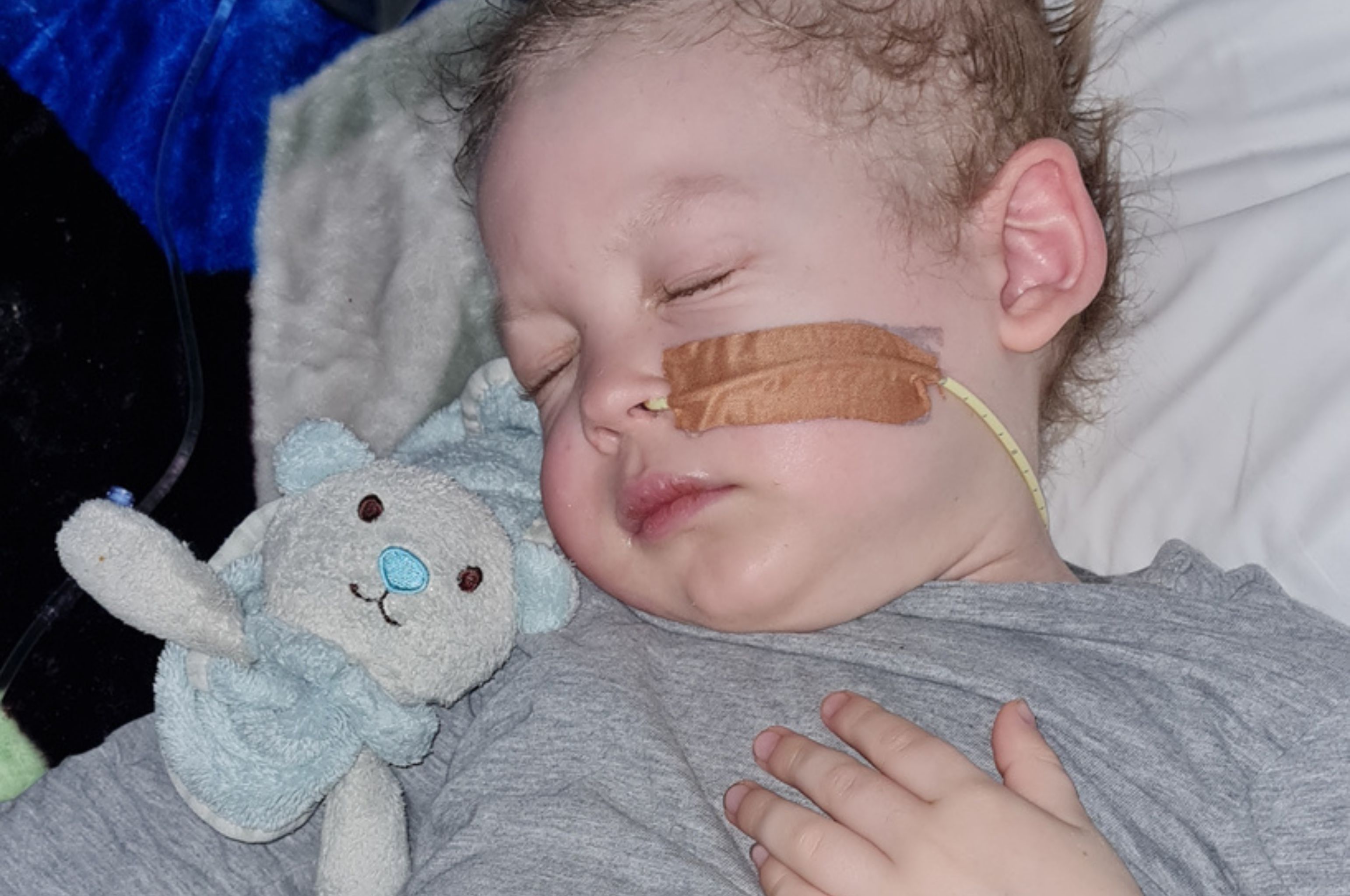 Alex asleep in hospital