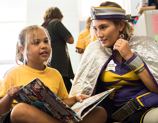 captain-starlight-and-girl-reading