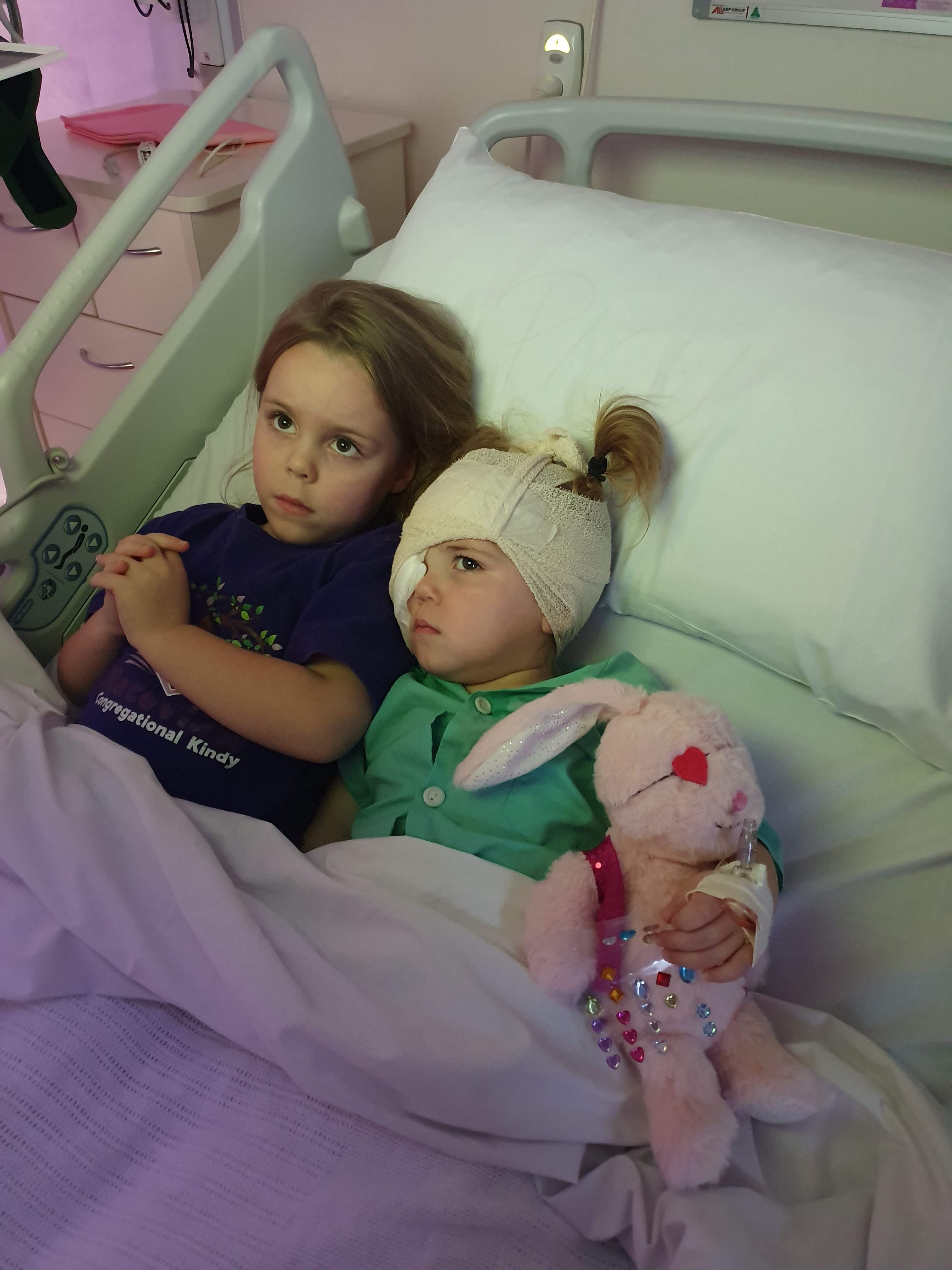 Thea in hospital bed