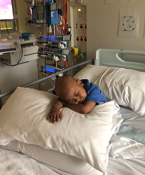 Taiyo asleep in hospital bed