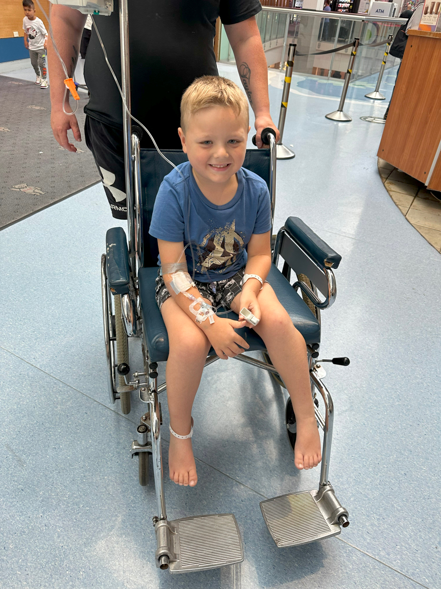 Zachary in his wheelchair