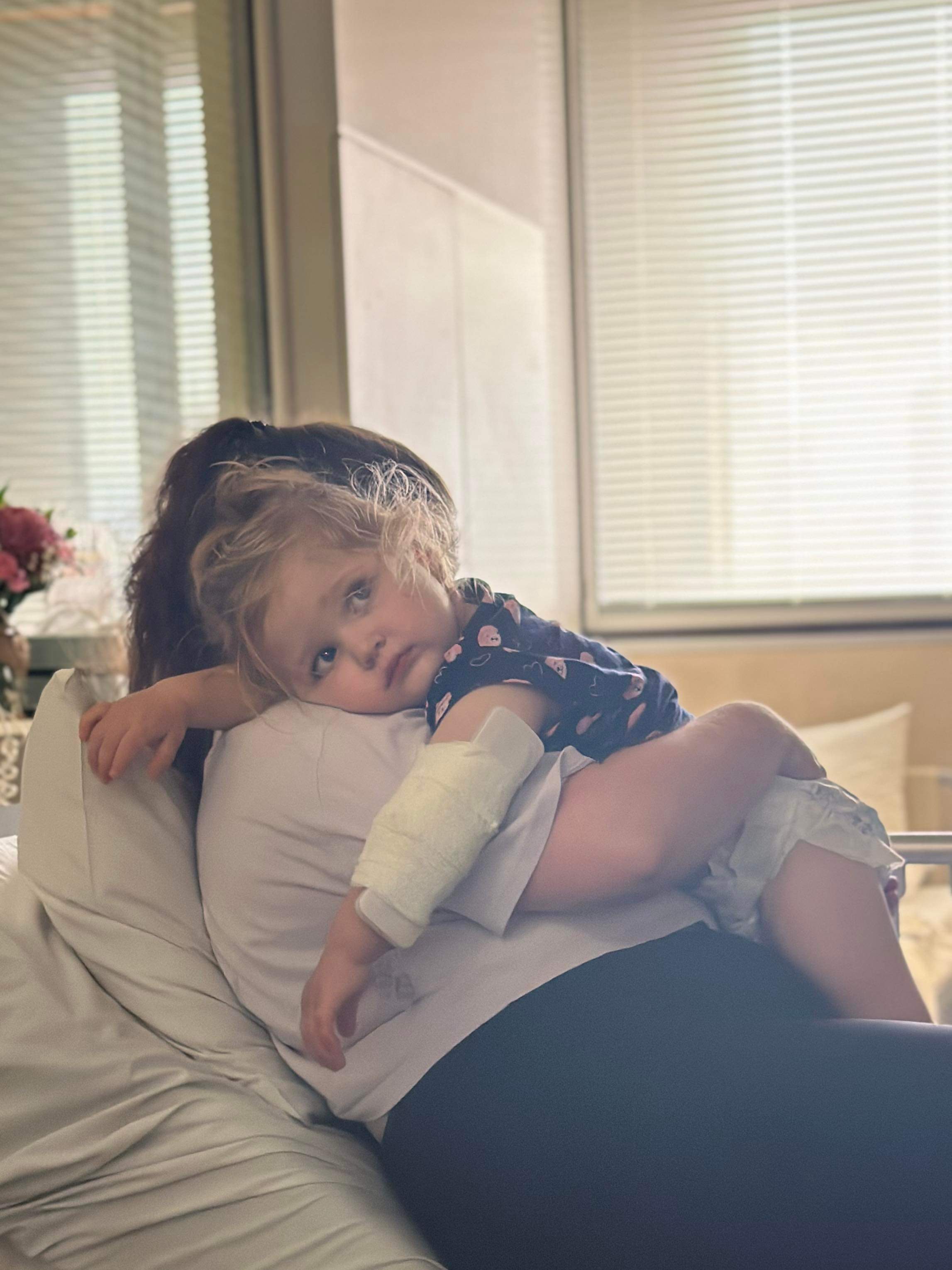 Lottie in hospital with mum