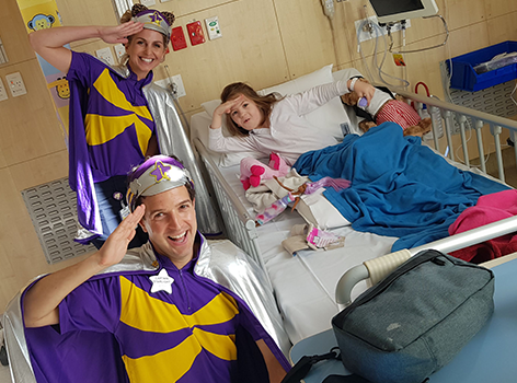 Captain Starlight visits Anabela on the hospital ward