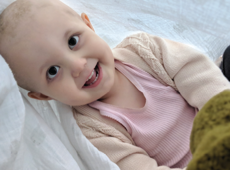 Harper smiling lying down
