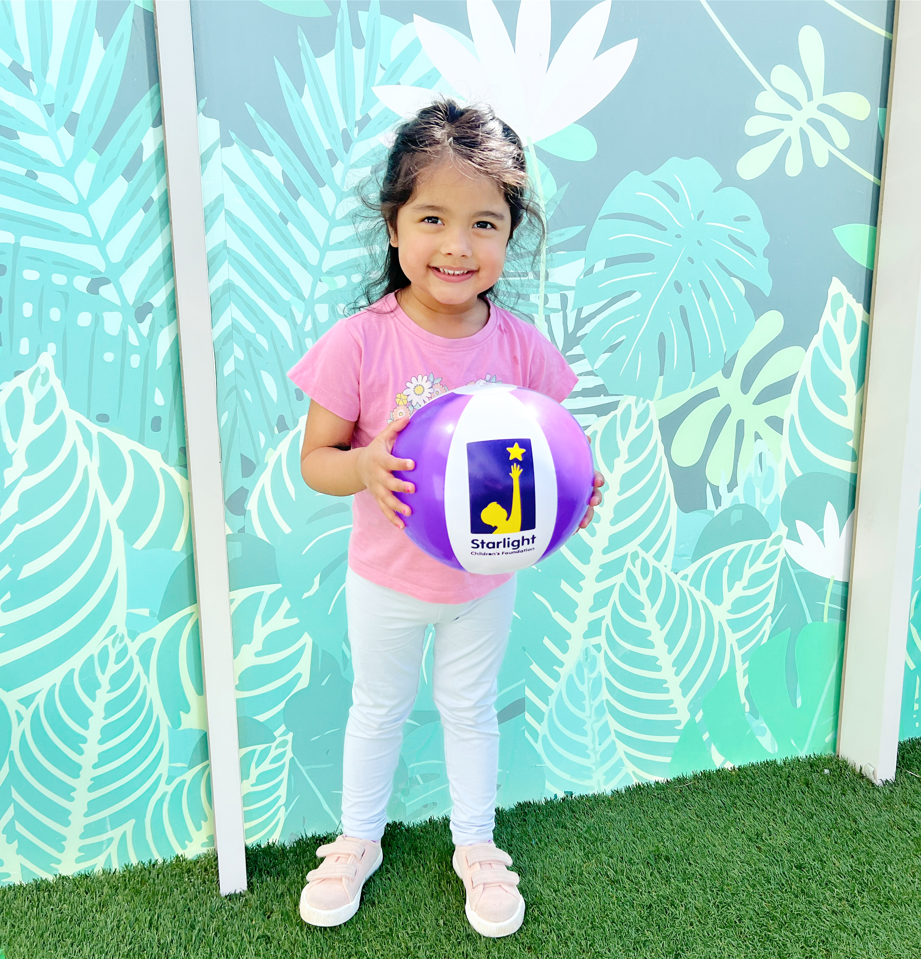 Priya holding ball