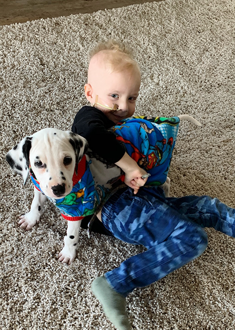 Hunter with his new puppy Rocky