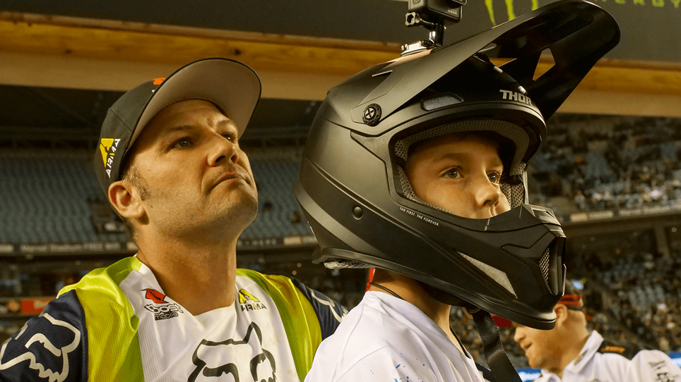 Gus wearing motorbike helmet