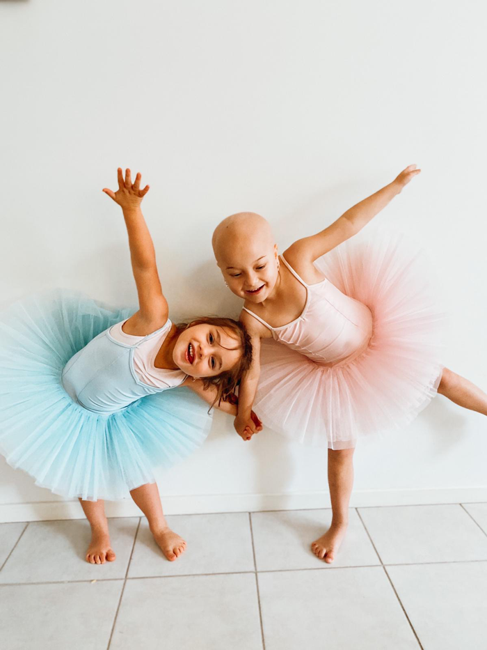 Isla and sister in tutus