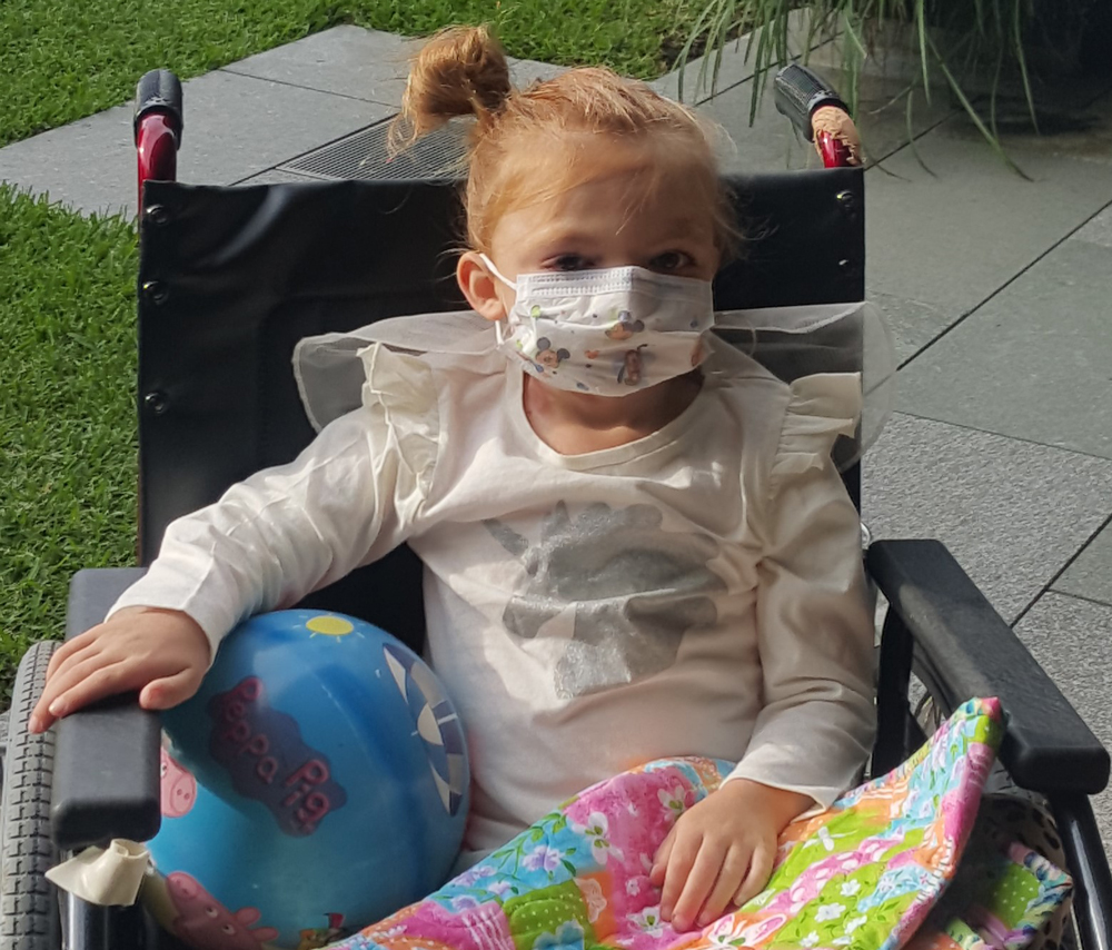 Nikiaya in wheelchair