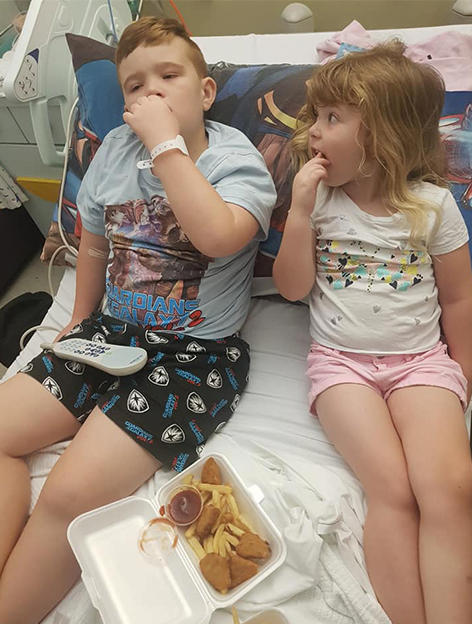 Jack in hospital with his sister