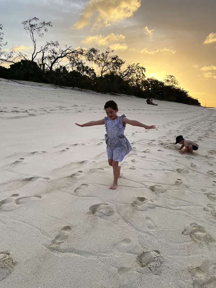 Molly dancing on the beach
