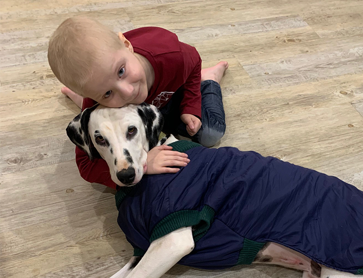 Hunter hugging Rocky