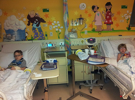 Damian and Jesse in hospital ward