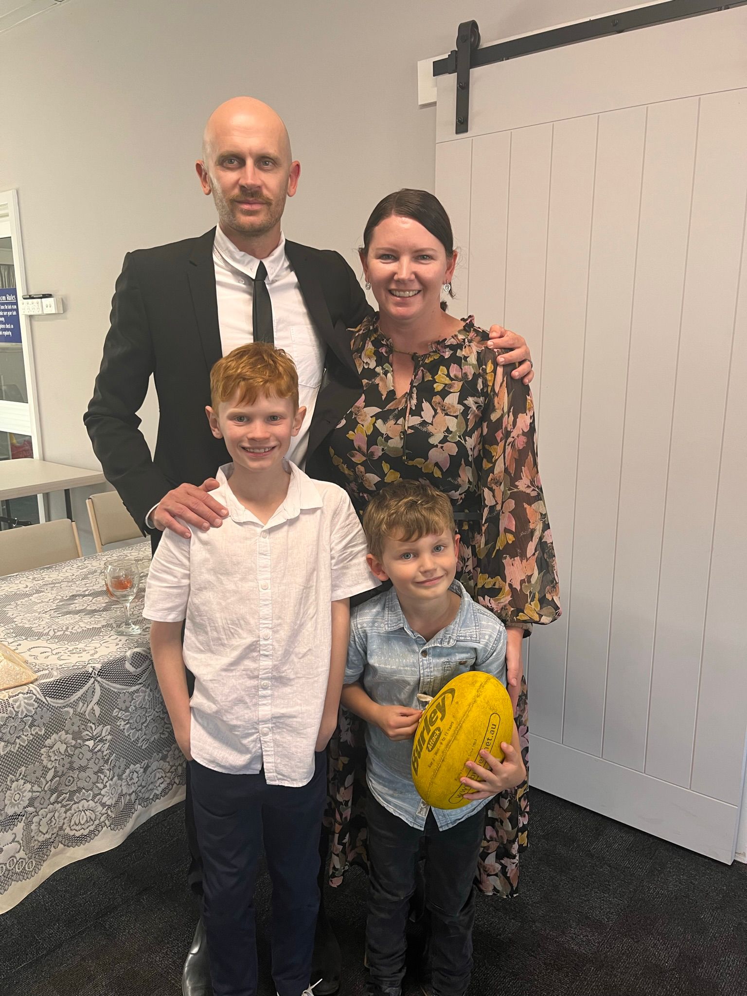Beau and family pose