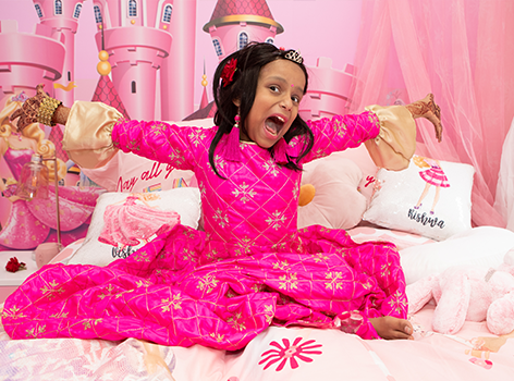 Vishwa sitting in her bedroom