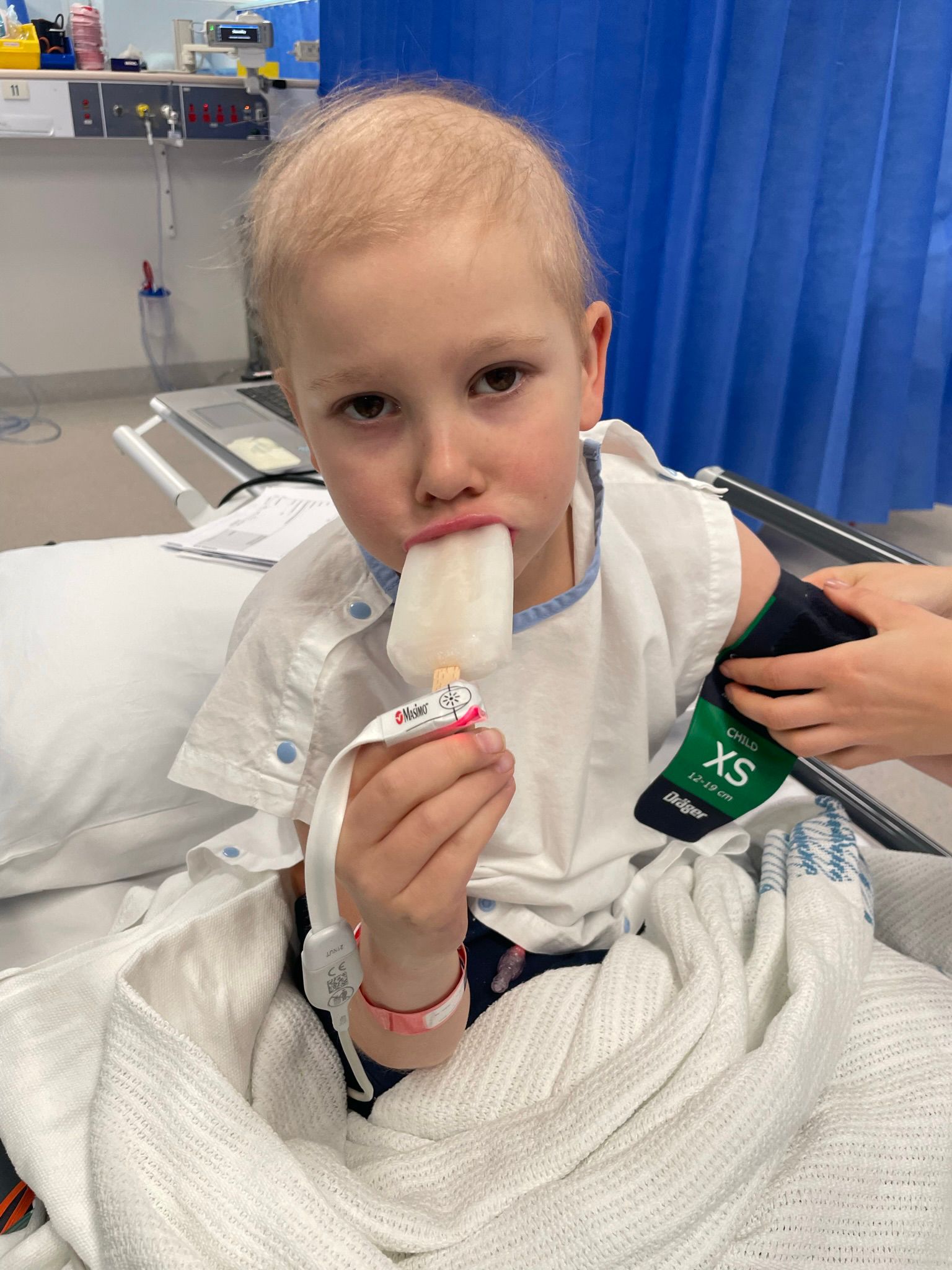 Sam in hospital bed