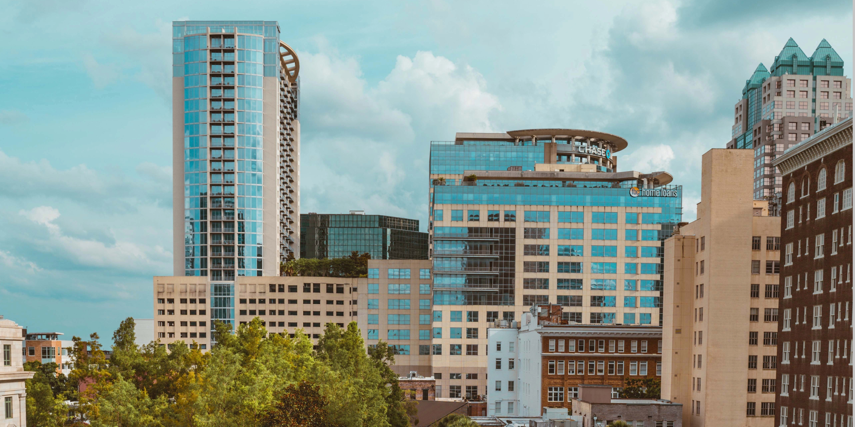 Hero image of an Orlando cityscape, including luxury apartment buildings that accept Rhino in Florida