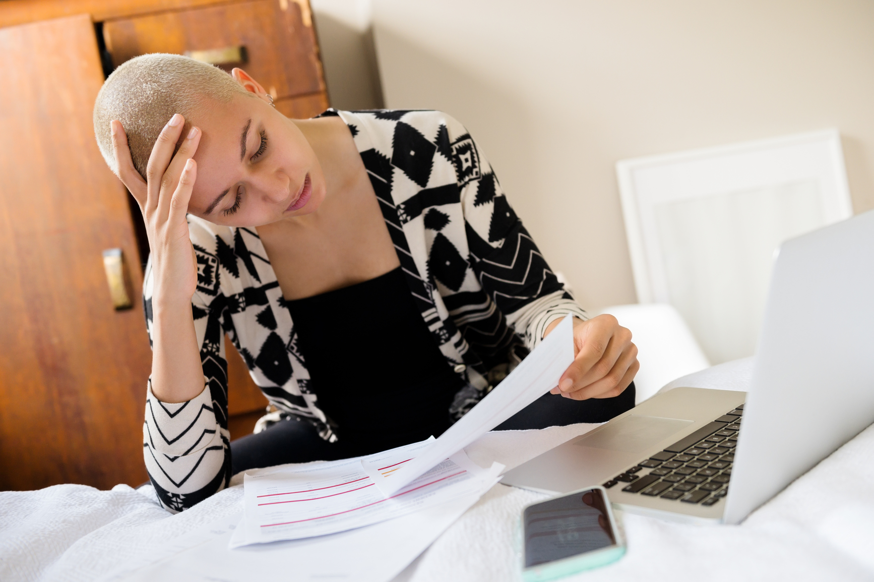 An image of a leasing agent doing paperwork.