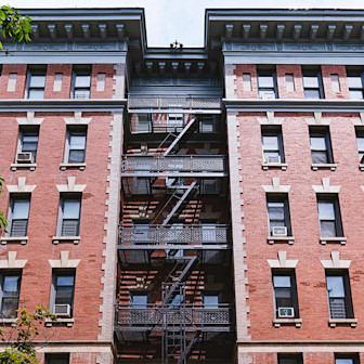 red brick multifamily building in nyc