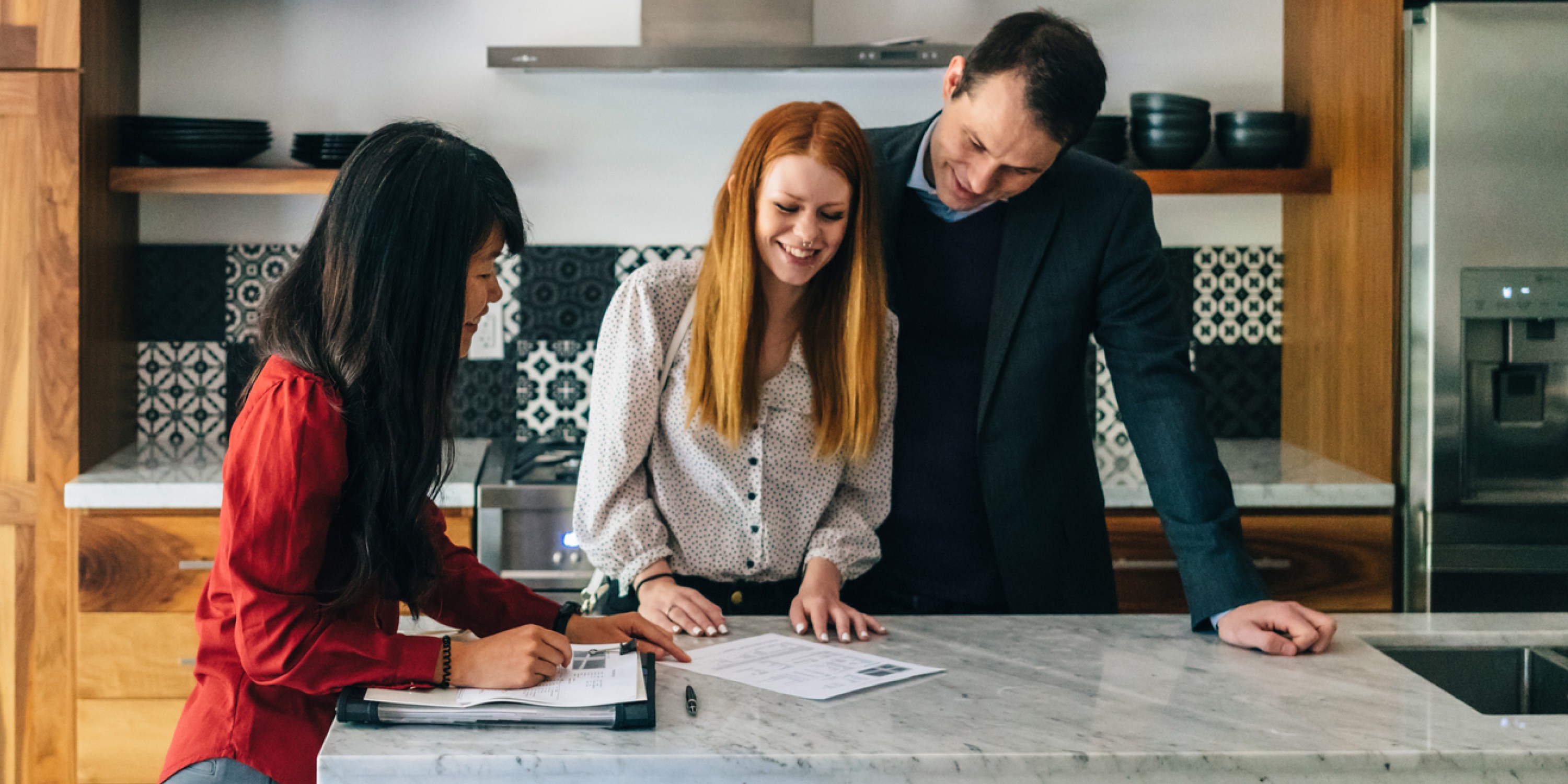 Renters want to renew their lease in their apartment kitchen