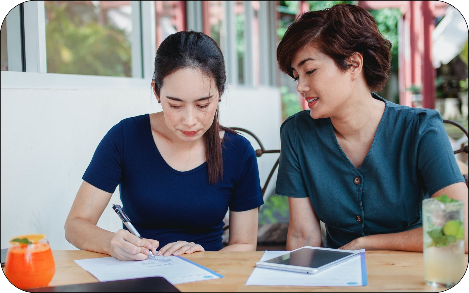 Image of renters discussing how to renew their lease