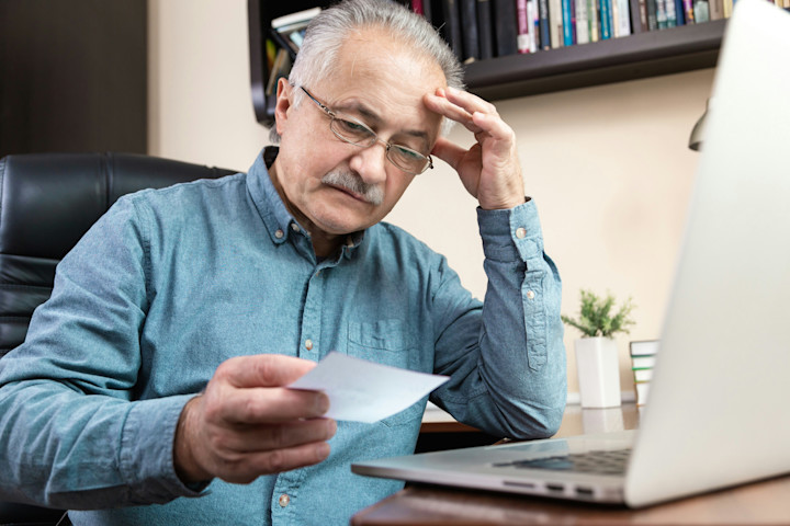 man reviewing finances