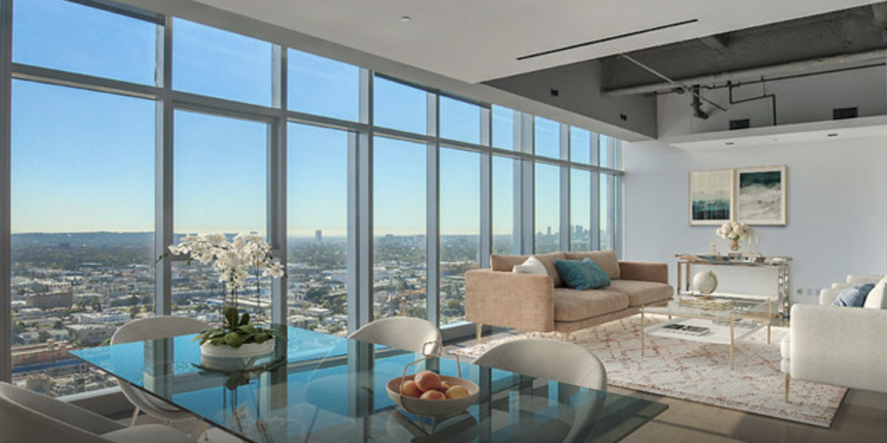 An image of a high rise apartment with beautiful windows and a view of Los Angeles 