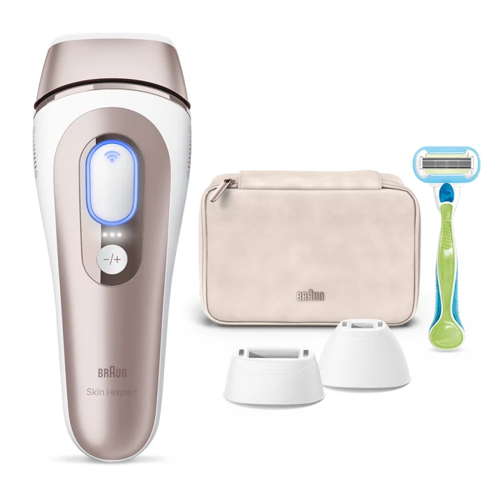 Centered IPL device, behind it a pouch, a mobile device with Skin-i-Expert app and three attachments