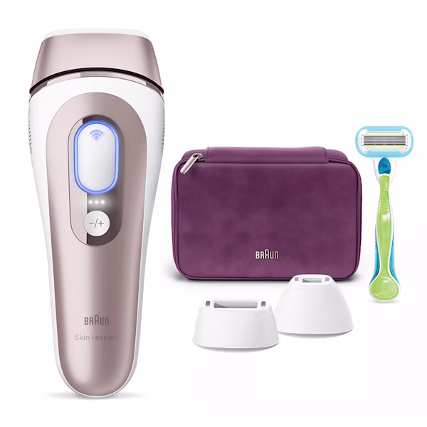 Centered IPL device, behind it a purple pouch, a mobile device with Skin-i-Expert app and three attachments Centered IPL device, behind it a purple pouch, a mobile device with Skin-i-Expert app and three attachments