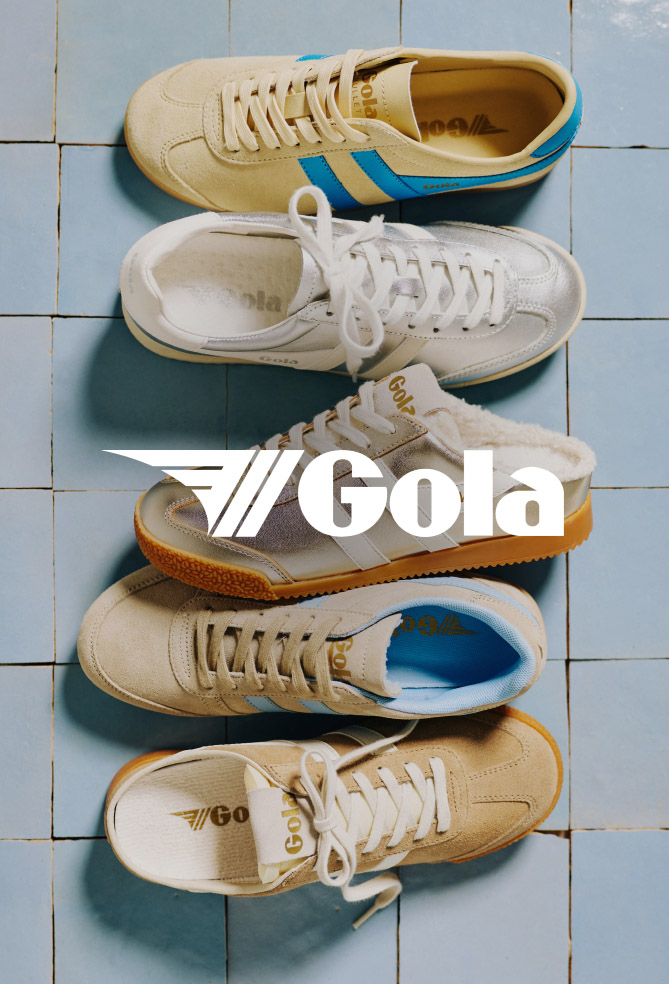 Five Gola sneakers in beige and white with colorful accents arranged vertically on light blue wooden surface with Gola logo.