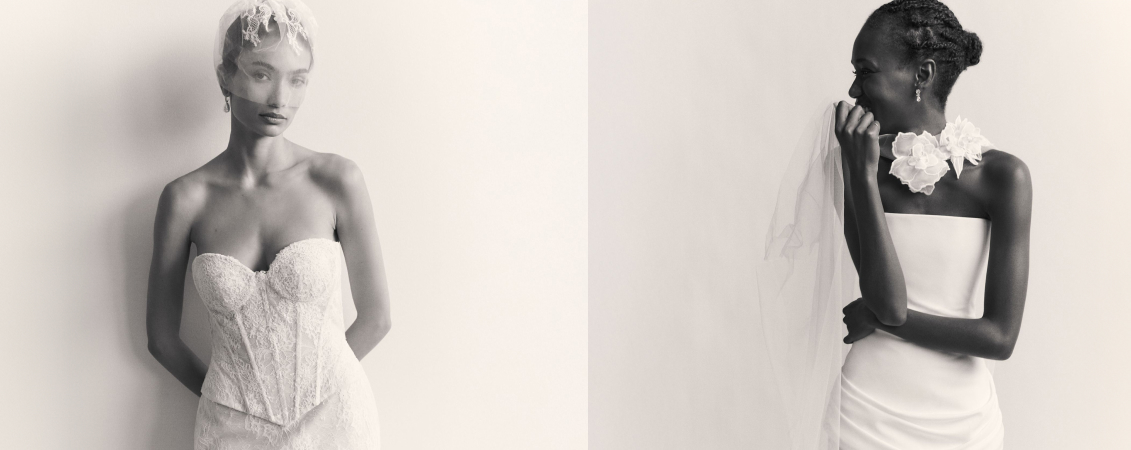 Two models in white bridal gowns, one in a lace corset and one in a strapless dress with veil and flower accessory