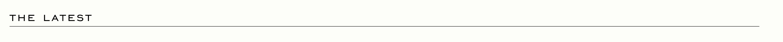 THE LATEST - Black text header on white background with thin horizontal line below
