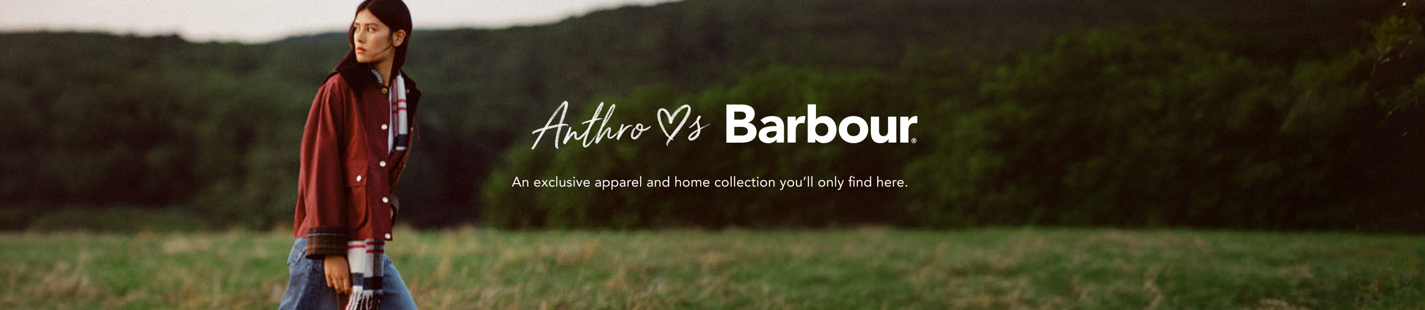 Woman in red Barbour jacket and jeans standing in green countryside with text "Anthro Loves Barbour" on right side