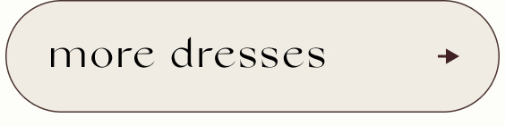 Text button reading 'more dresses' in black serif font on beige background with teal arrow on right side