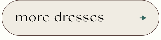 Text button reading 'more dresses' in black serif font on beige background with teal arrow on right side
