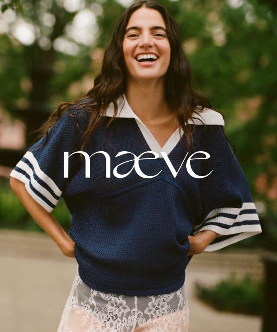 Young woman laughing outdoors wearing navy sweater with white stripes and white collar, with text "maeve" overlaid