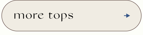 Beige rounded rectangular button with black text reading 'more tops' and a right-pointing arrow on the right side