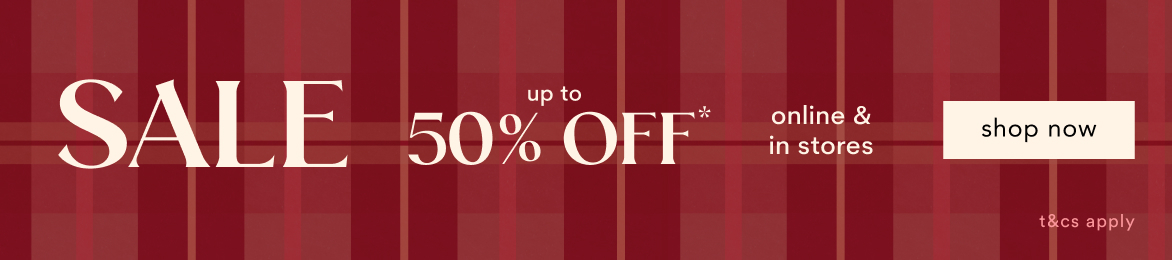Red plaid banner reading SALE up to 50% OFF online and in stores with shop now button on right side