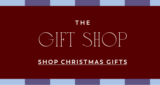 THE GIFT SHOP - SHOP CHRISTMAS GIFTS text on dark red background with blue and purple striped border at top and bottom