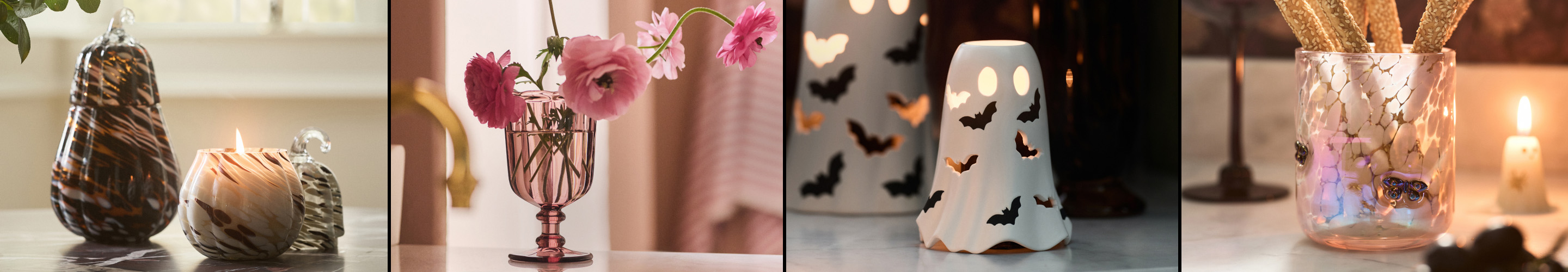 Four seasonal home decor vignettes: plaid pumpkins with candle, pink flowers in glass vase, bat-decorated lantern, and wheat in vase.
