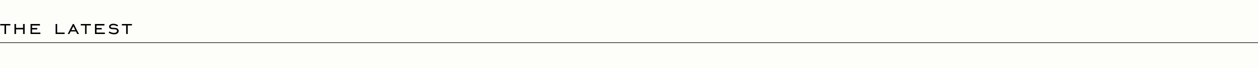 THE LATEST - Black text header on white background with thin horizontal line below