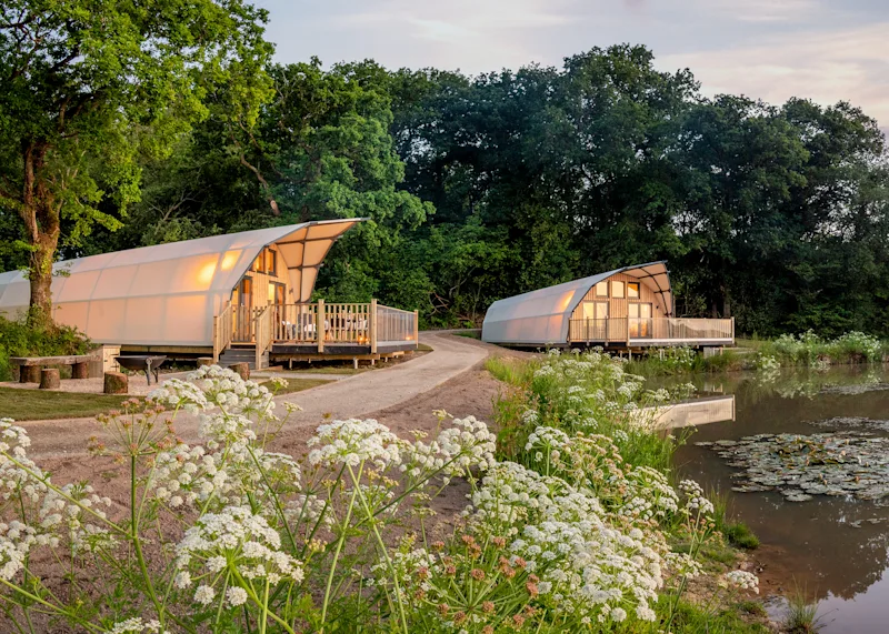 Luxury glamping pods at Clawford Lakes Resort and Spa (CLAL) in Clawton, Nr Holsworthy, North Devon, England, UK