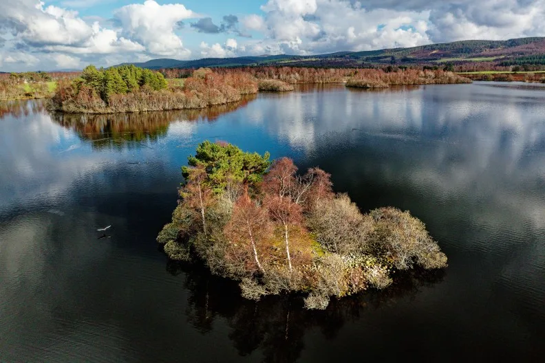 Loch Kinord in Muir of Dinnet National Nature Reserve, Cairngorms National Park, Scotland, UK