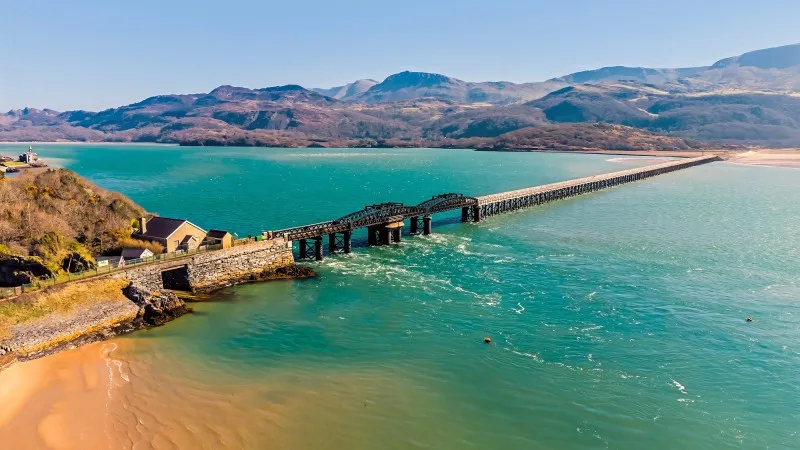 An aerial view towards the railway bridge at Barmouth, Wales
