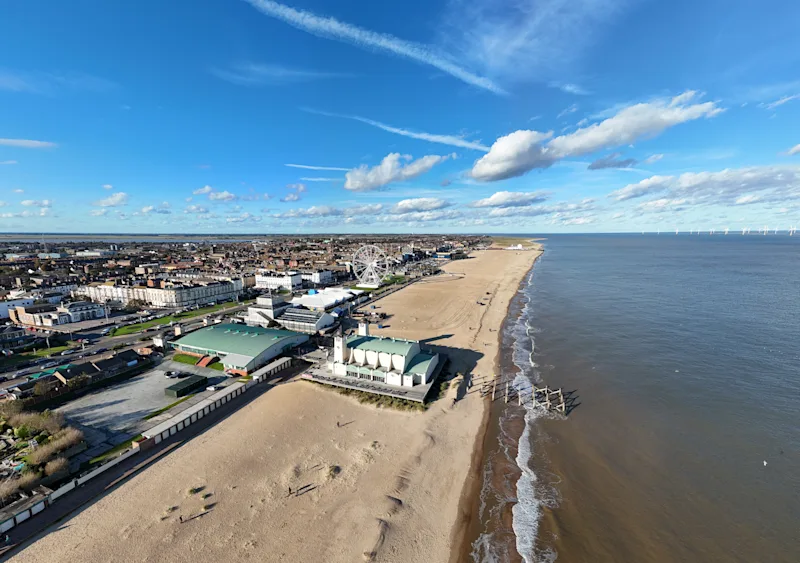 Aerial view of Great Yarmouth pier, beach and seafront on a sunny day in Norfolk, England, UK