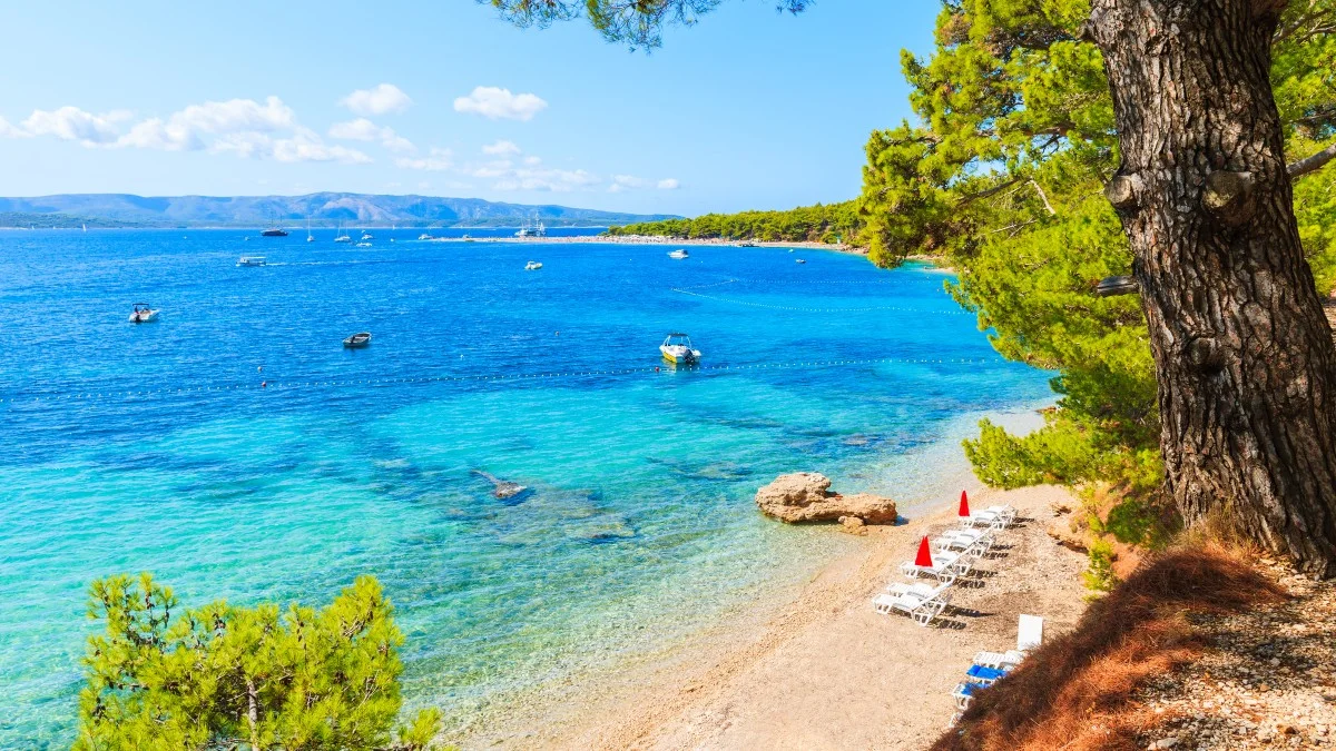 View of beautiful beach near Zlatni Rat at Bol on Brac island in summertime, Croatia