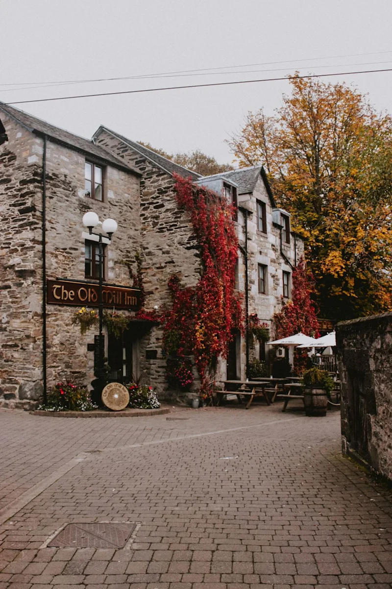 Exterior of a traditional stone pub in Pitlochry, Scottish Highlands, Scotland, UK