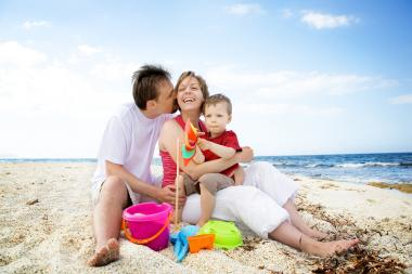 Familie am Strand Italien