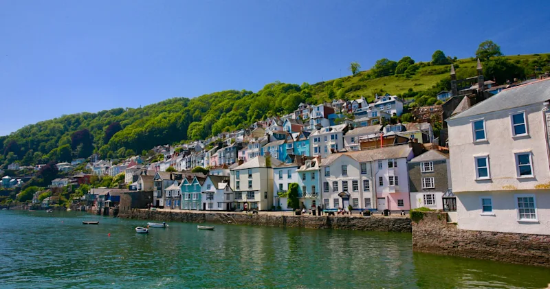 Colourful buildings along the riverfront in Dartmouth, Devon, UK